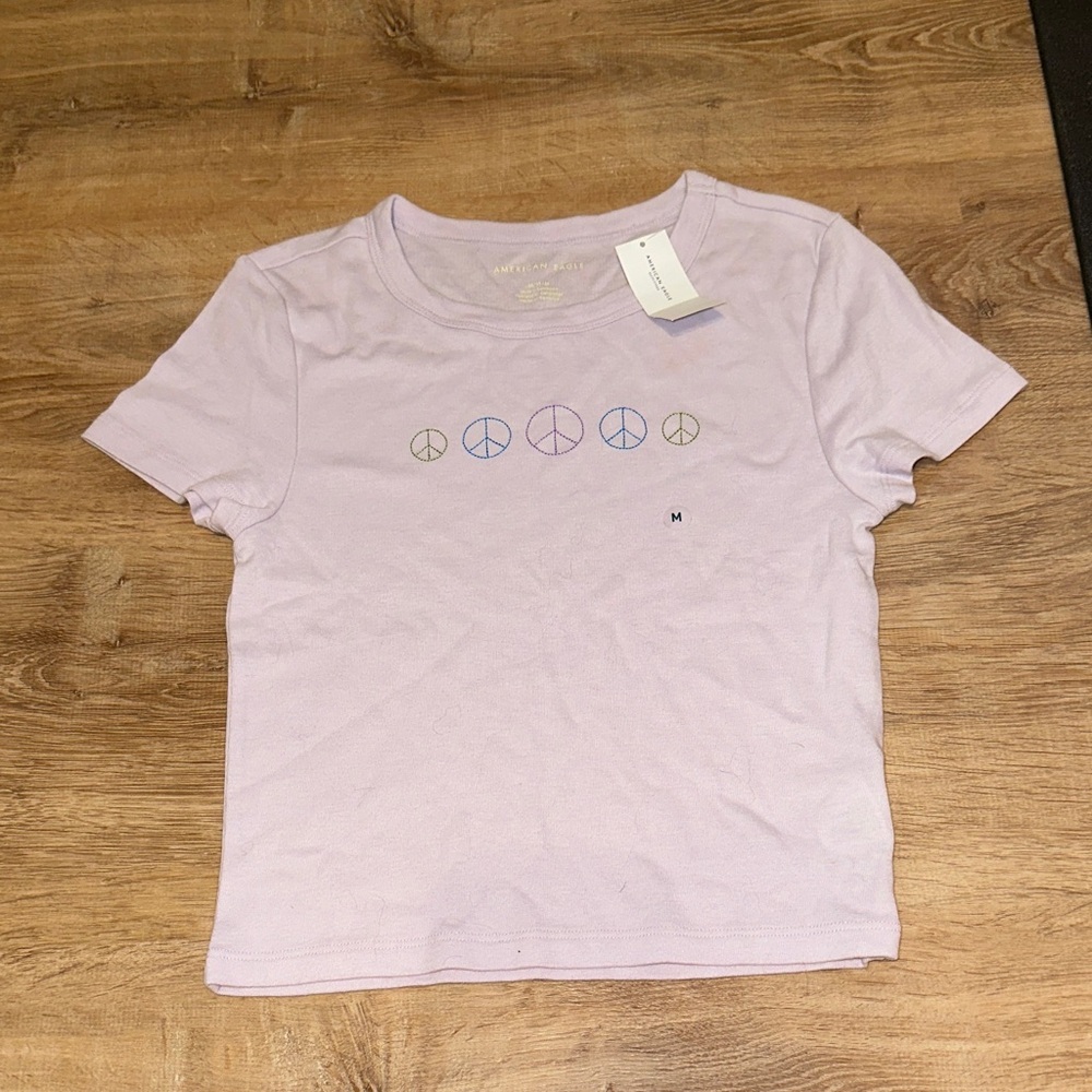 American Eagle Outfitters Lavender Peace Sign Baby Tee